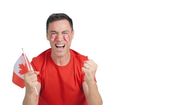 Man passionately cheering for Canada screaming and waving a national flag