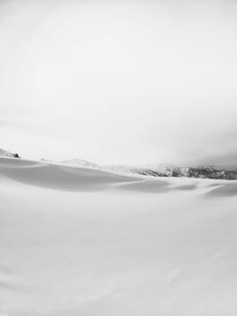 Minimalistic winter vertical andscape in the mountains of Central Asia, copy space.