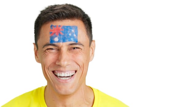 Close up of a man with a australian flag painted on the face smiling at camera