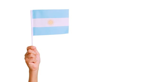 Picture of wind waving a argentine pennant holding by a hand