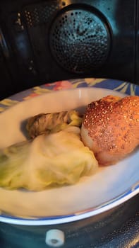 food vegetables, stuffed cabbage, schnitzel in a plate. High quality photo