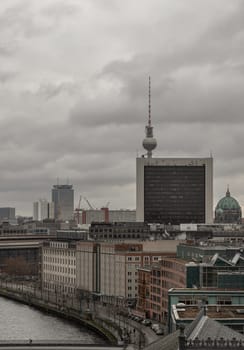 Berlin, Germany - Dec 20, 2023 - Berlin cityscape view from above of Reichstag building with Berlin Television Tower, Berliner Dom, Marschall Bridge, River Spree and buildings at the downtown Berlin. a major tourist attraction of the berlin city, Space for text, Selective focus.