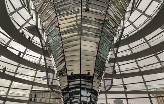 Berlin, Germany - Dec 20, 2023 - Architecture interior of the Cupola of the Reichstag dome is a glass dome constructed on top of the rebuilt Reichstag building. a major tourist attraction of the berlin city, Copy space, Selective focus.
