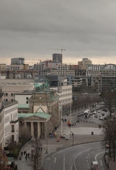 Berlin, Germany - Dec 20, 2023 - Berlin cityscape view from above of Reichstag building with the Brandenburg Gate and the Eberstrasse and buildings at the downtown Berlin. a major tourist attraction of the berlin city, Space for text, Selective focus.