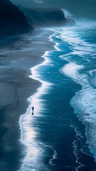 An individual strolls along the sandy shoreline, admiring the natural landscape of the coast and oceanic landforms while listening to the soothing sound of water and wind waves in the atmosphere