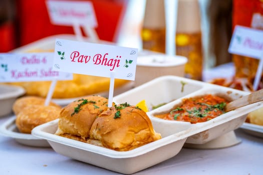 disposable plate showing pav bhaji a popular indian snack with bread and mashed vegetables common street food in places like mumbai India