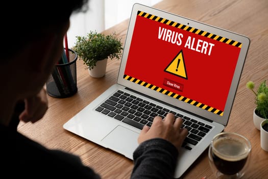 Virus warning alert on computer screen detected modish cyber threat , hacker, computer virus and malware