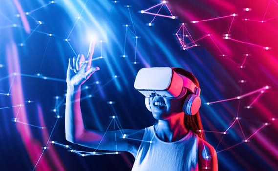 Smart female standing in cyberpunk style building in meta wear VR headset connecting metaverse, future cyberspace community technology, Elegant woman using fingers touch virtual object. Hallucination.