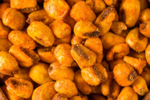 Top view of Corn nuts with sauce. Roasted corn snack food background