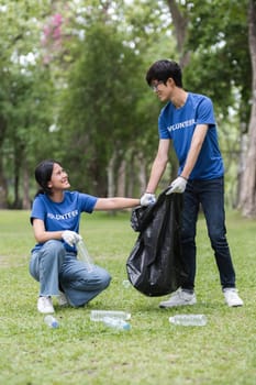 A dedicated volunteer team picking up trash in a park, showcasing community effort and environmental responsibility.