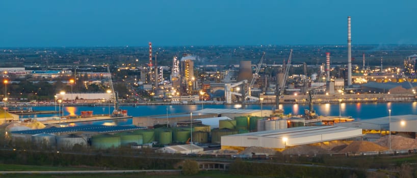 Industrial and port area of Ravenna ,chemical and petrochemical pole,thermoelectric,metallurgical plants and hydrocarbon refinery and liquefied natural gas tanks at night