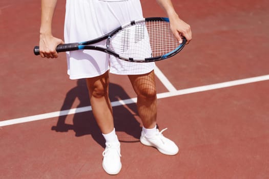 young woman playing tennis on the tennis court, olympic sport, outdoor activity concept