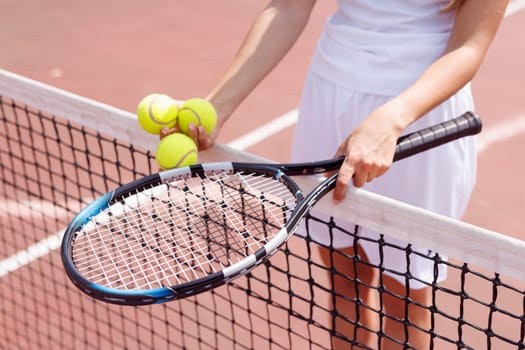 young woman playing tennis on the tennis court, olympic sport, outdoor activity concept