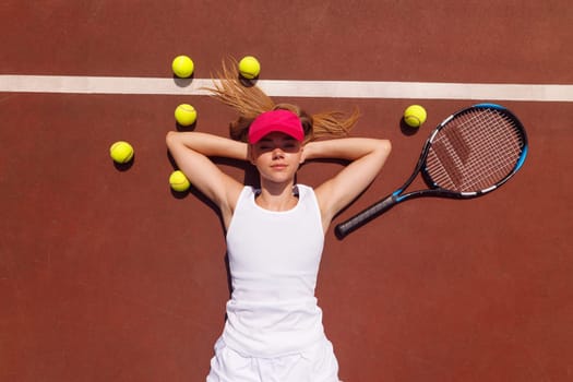 young woman playing tennis on the tennis court, olympic sport, outdoor activity concept