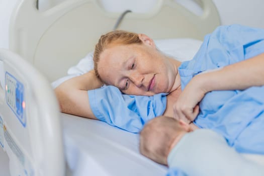 A mom breastfeeds her newborn baby in the hospital. The intimate moment fosters bonding between mother and child, promoting emotional connection and providing essential nourishment for the baby's well-being.