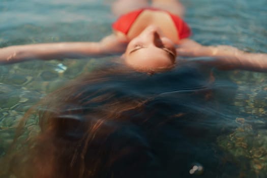 Happy woman sea relaxing floating in transparent sea water on summer holiday. Travel leisure recreation lifestyle, female in nature