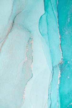 An abstract painting featuring swirling shades of aqua with gold accents.