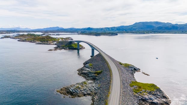 An aerial view of the Atlantic Road Bridge in Norway, showcasing its unique design and the stunning coastal scenery.