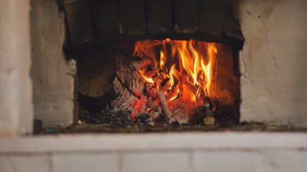 Burning fire in a Russian stove in the village