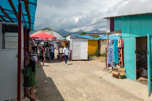 street market at sunny summer day in Cholpon-Ata, Kyrgyzstan - July 4, 2023