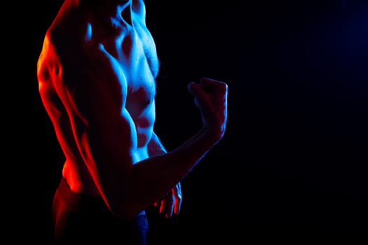 Fitness, man and back of body builder in closeup with strong muscle from training and workout. Health, male person or topless athlete in studio for exercise and weight loss with black background
