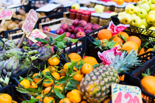 Open air market in Italy, different fruit. Madeira's fruits, a pineapple lemon orange