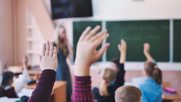 Image of pupils stretching their hands during the lesson