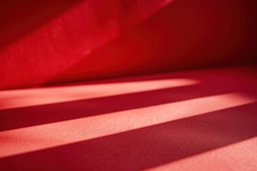 Comfortable red couch with sunlight shining through window, creating shadows on wall in cozy living room interior