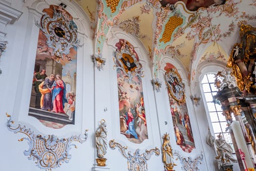 SCHONGAU, BAVARIA, GERMANY, JUNE 01, 2022 : interiors, frescoes and architectural decors of  Schongau church by various anonymous artists, 18th century