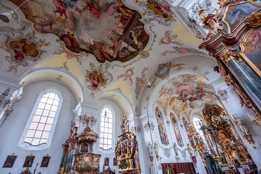 SCHONGAU, BAVARIA, GERMANY, JUNE 01, 2022 : interiors, frescoes and architectural decors of  Schongau church by various anonymous artists, 18th century