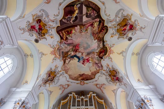 SCHONGAU, BAVARIA, GERMANY, JUNE 01, 2022 : interiors, frescoes and architectural decors of  Schongau church by various anonymous artists, 18th century