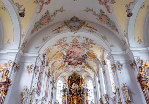 SCHONGAU, BAVARIA, GERMANY, JUNE 01, 2022 : interiors, frescoes and architectural decors of  Schongau church by various anonymous artists, 18th century