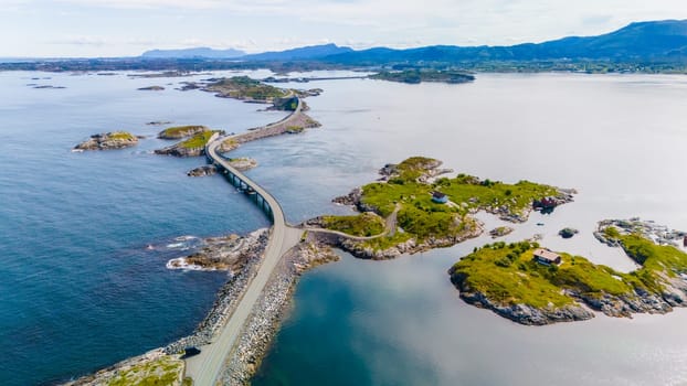 An aerial view of the Atlantic Road bridge in Norway, a scenic road that connects several islands and is known for its stunning views of the Norwegian coastline.