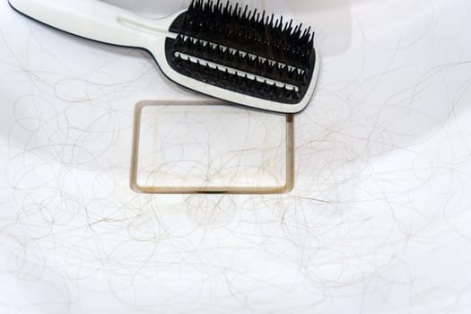 Woman holding bunch hair. Hair loss problem. Healthcare concept. Selective focus