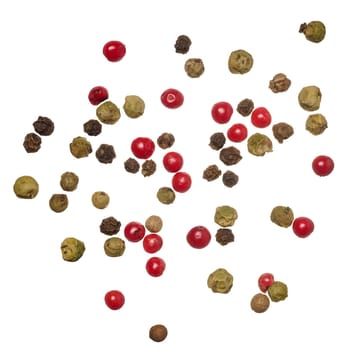 Mixture of red, green and black peppercorns on isolated background, top view