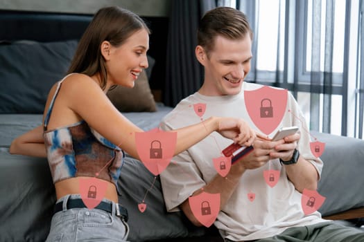 Female and male customer watch laptop consulting. user open hologram graphic interface of protection application using credit card, cashless technology, for security system authentication. Cybercash.