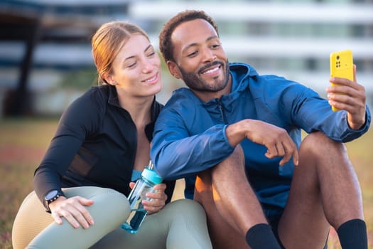 Happy, smiling, sporty friends, ready to exercise or train take a self-portrait. an active lifestyle, health and well-being.