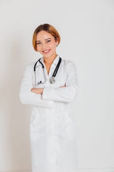 a woman doctor in white coat with stethoscope doctor hospital