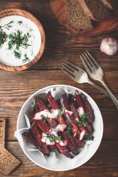 Oven baked beet fries with yogurt and dill dressing