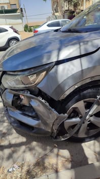 24 April 2024 Beersheva Israe broken bumper of a car, transport accident,. High quality photo