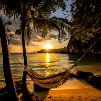 A hammock is hanging over a body of water, with the sun setting in the background. The scene is peaceful and serene, with the hammock providing a relaxing spot to unwind and enjoy the view