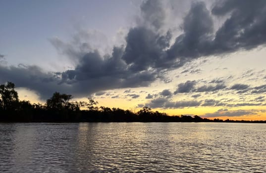 Coastal landscape. Evening on the beautiful Parana river. Horizontal photo.wallpaper. Banner for tourist promotion. space for text.