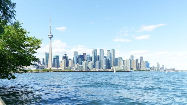 Panoramic view of Toronto skyline and Lake Ontario on a sunny day, Toronto, Ontario, Canada. TORONTO, ON Canada - 03.29. 2024