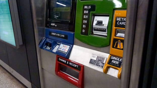 Blue ATM card reader with a slot for inserting a card and a numeric keypad New York NY USA 2023-07-30.