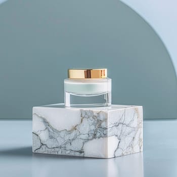Cosmetic cream in a glass jar on a blue backdrop. Skin care concept. Background for beauty products