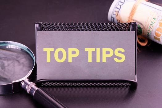 Text TOP TIPS business concept. TOP TIPS on the business card