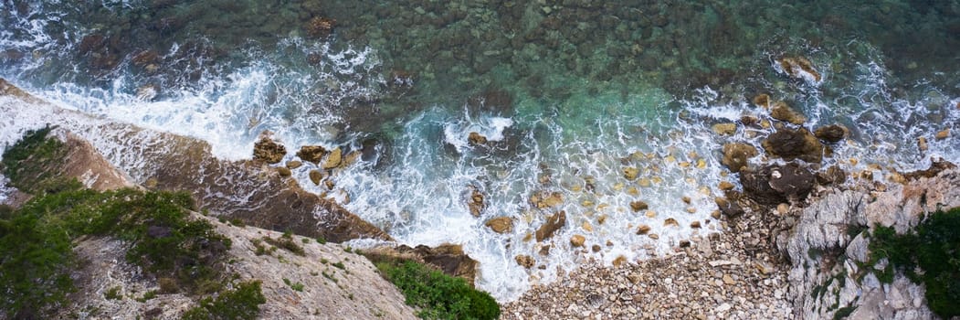 Aerial view of sea waves and fantastic Rocky coast, Montenegro.