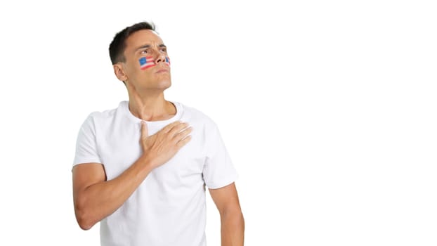 USA patriot listening to the national anthem with solemnity