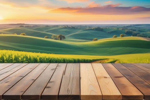The empty wooden table top with blur background of tea plantation. Exuberant image