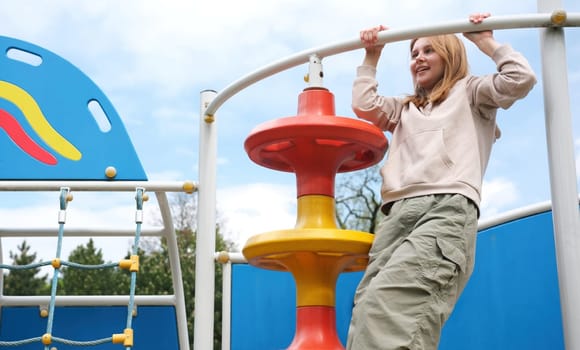 Adorable Young Girl Having Fun At A Park Playground After School